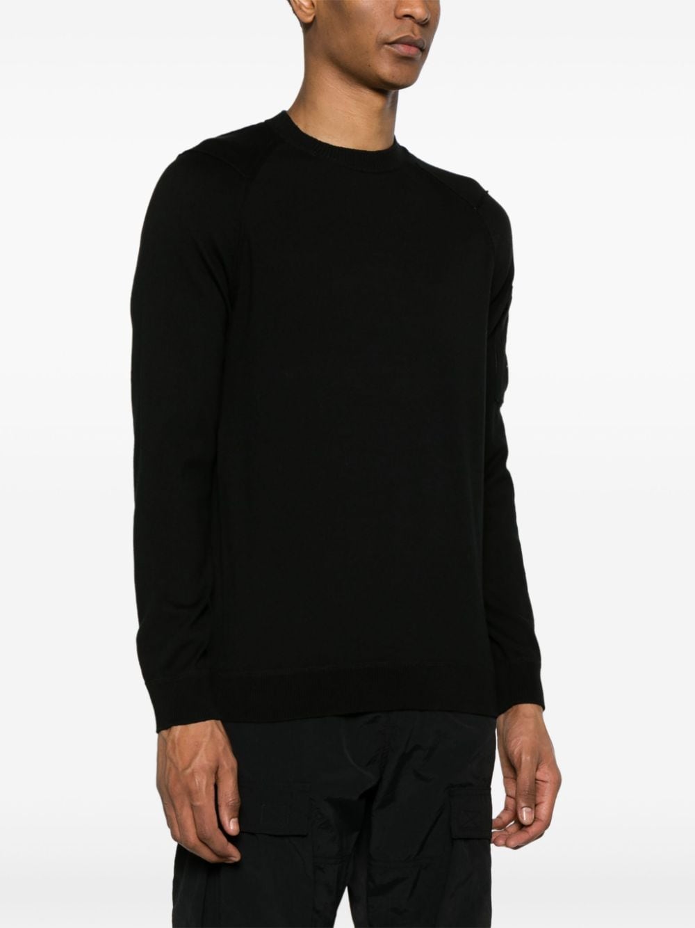 Black sweater with Lens logo pocket and reverse stitching