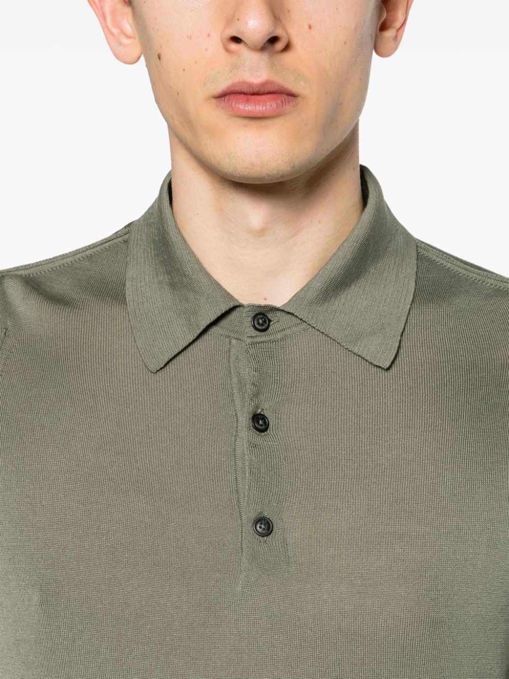 Polo verde in maglia fine