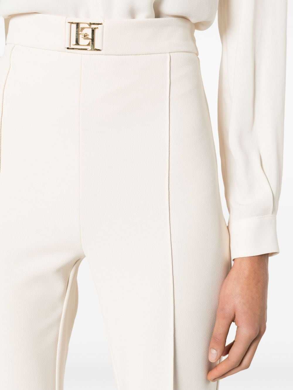 Palazzo trousers with butter logo plaque