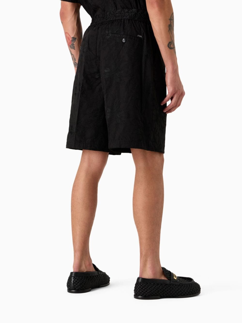 Black Bermuda shorts with embroidered pattern