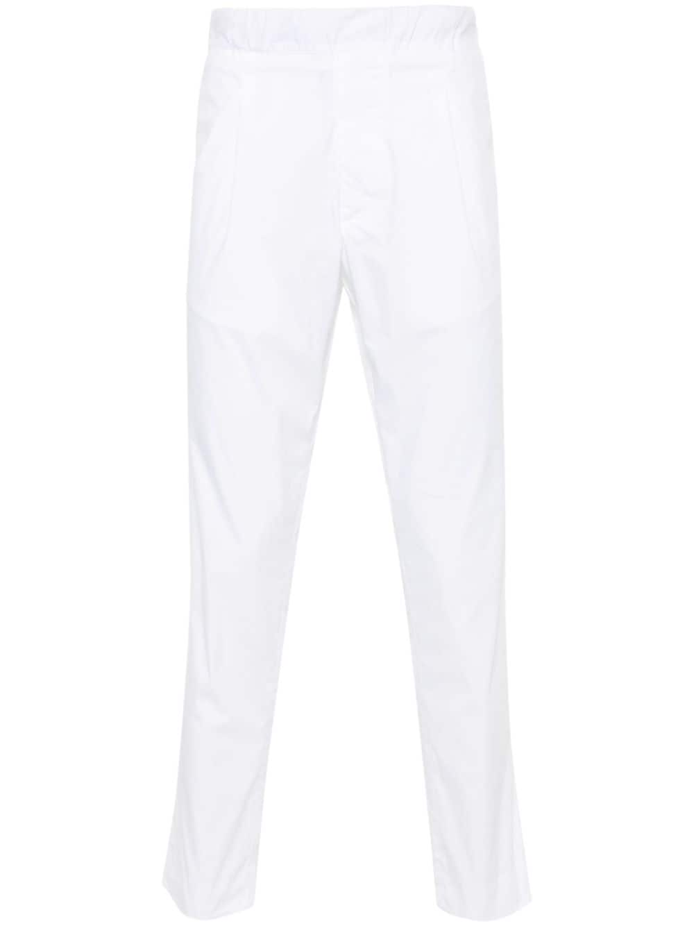 Tapered white trousers