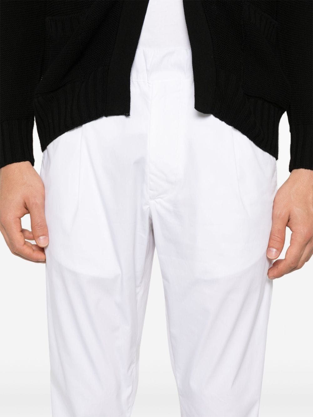 Tapered white trousers