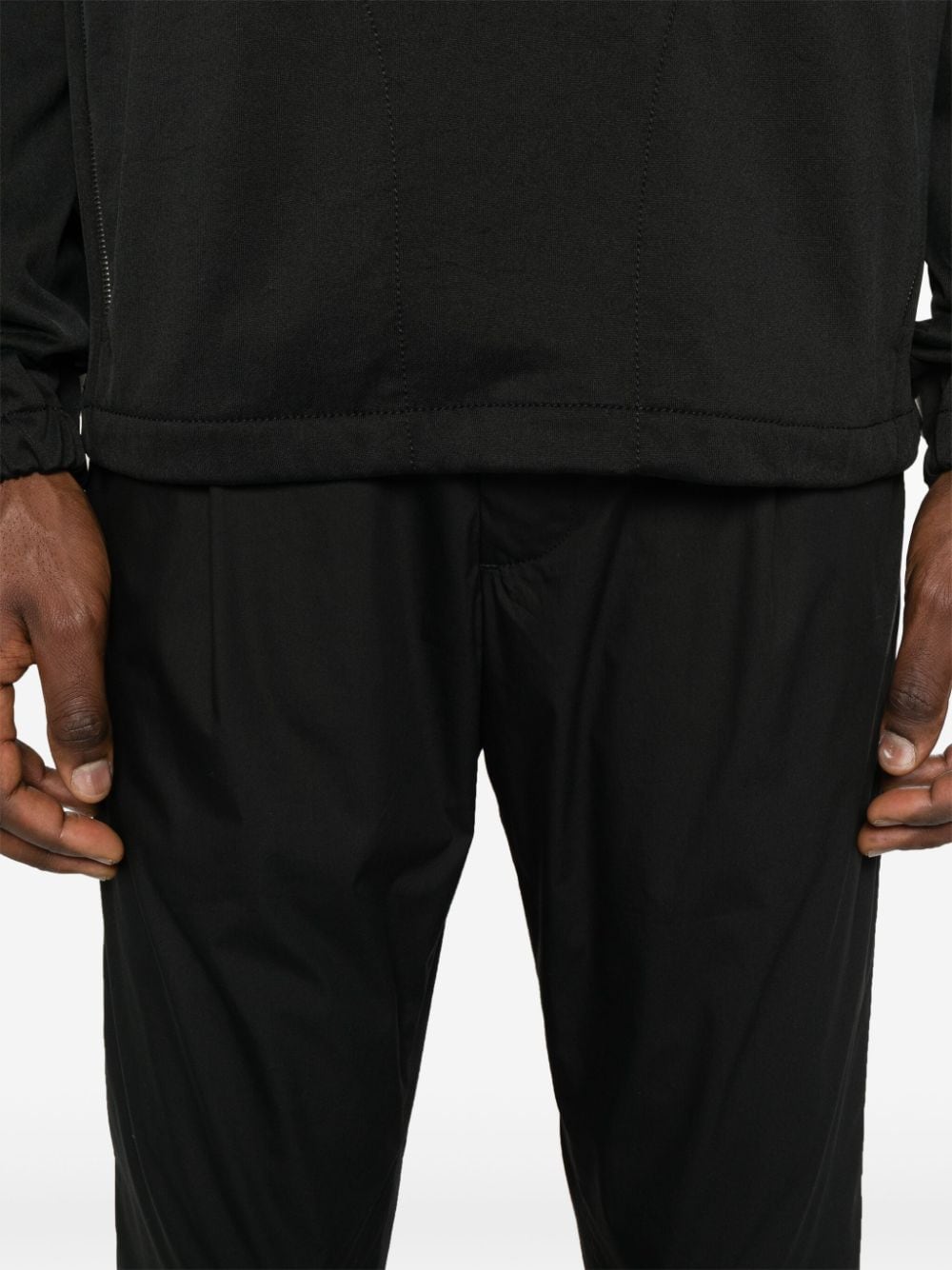 Black tapered trousers