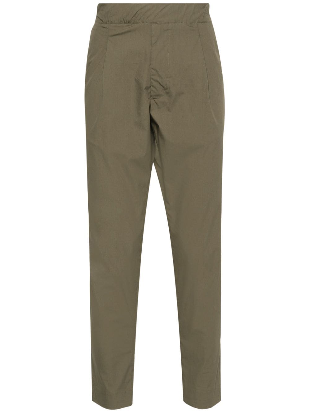 Green tapered trousers