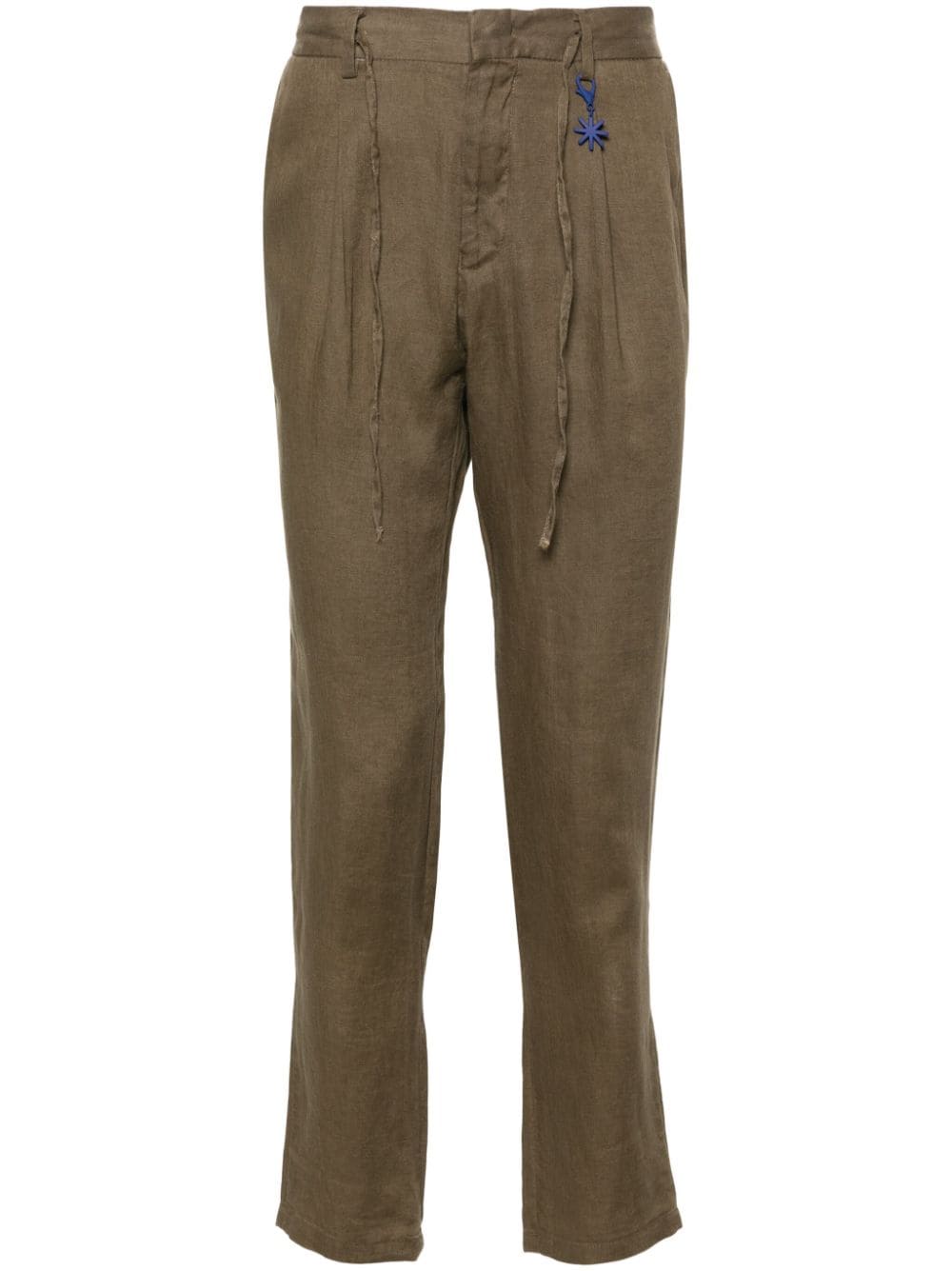 Green tapered linen trousers