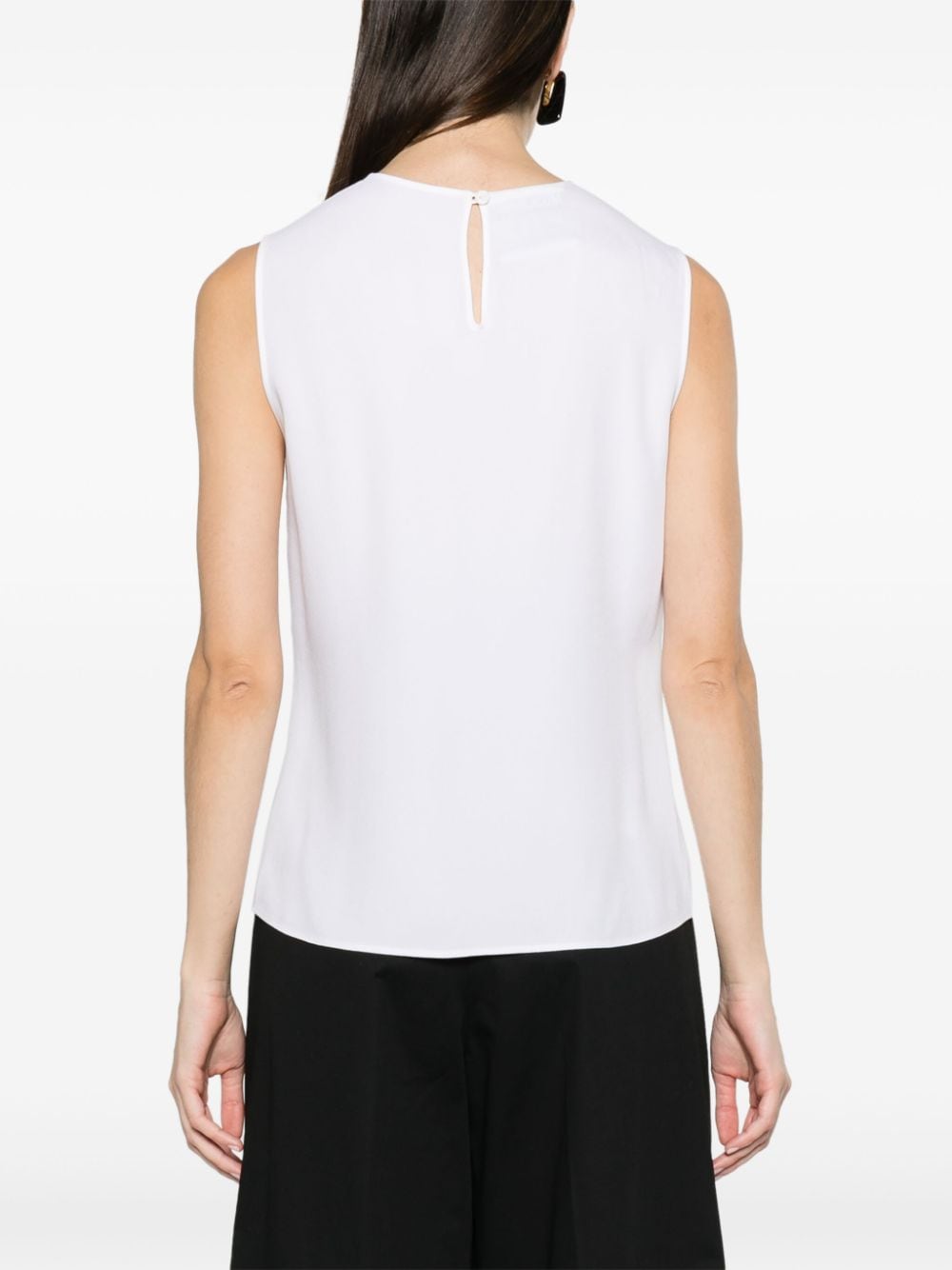 White sleeveless blouse cut-out heart