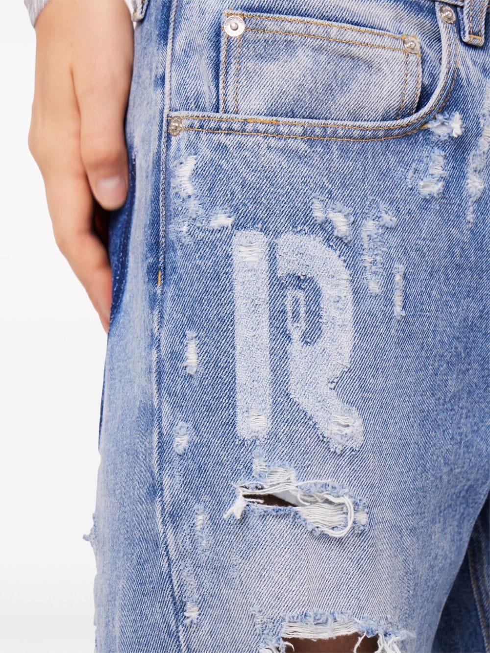 Blue distressed jeans