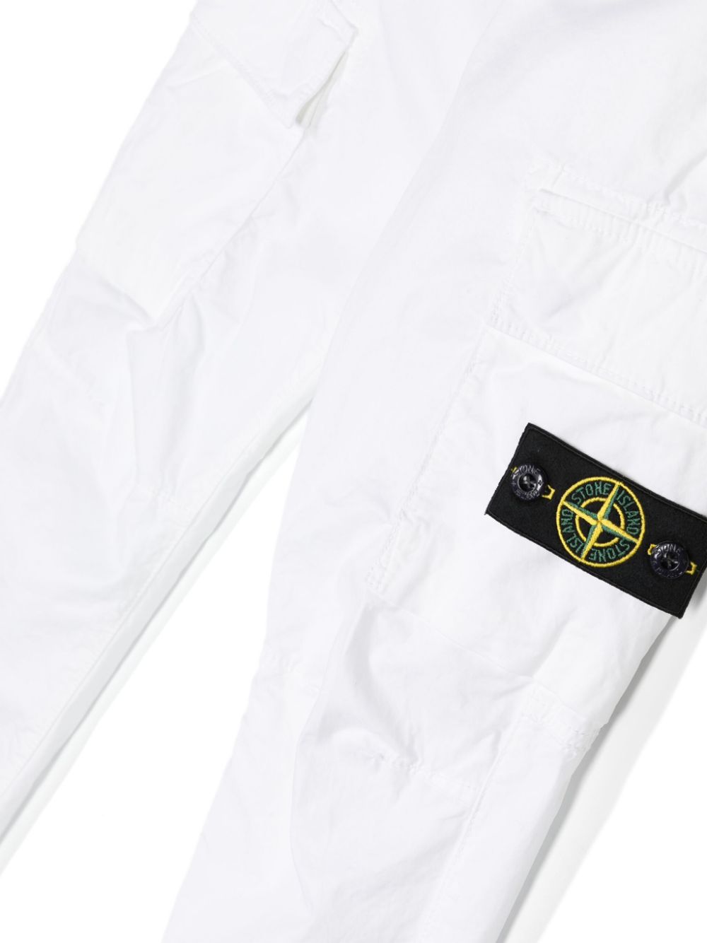 White cargo trousers with Compass label