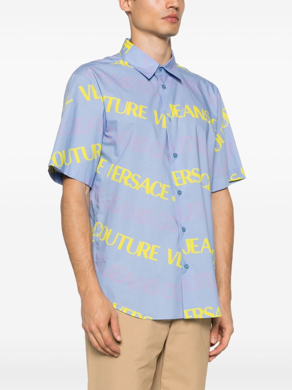 Light blue shirt with all-over logo