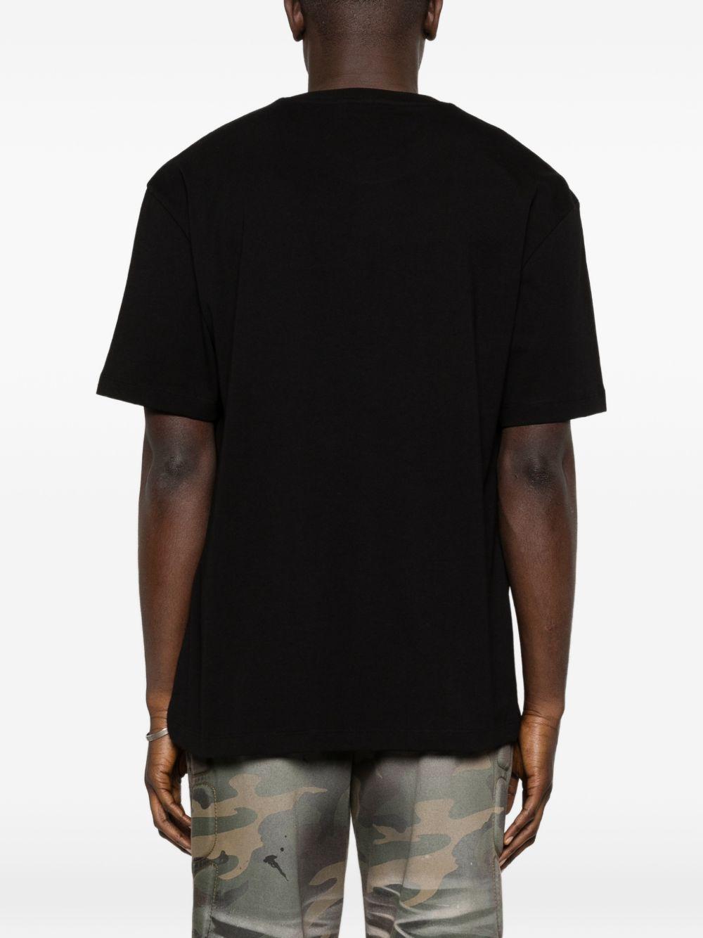 T-shirt in cotone con stampa grafica NUS26206 009 IH NOM UH NIT 