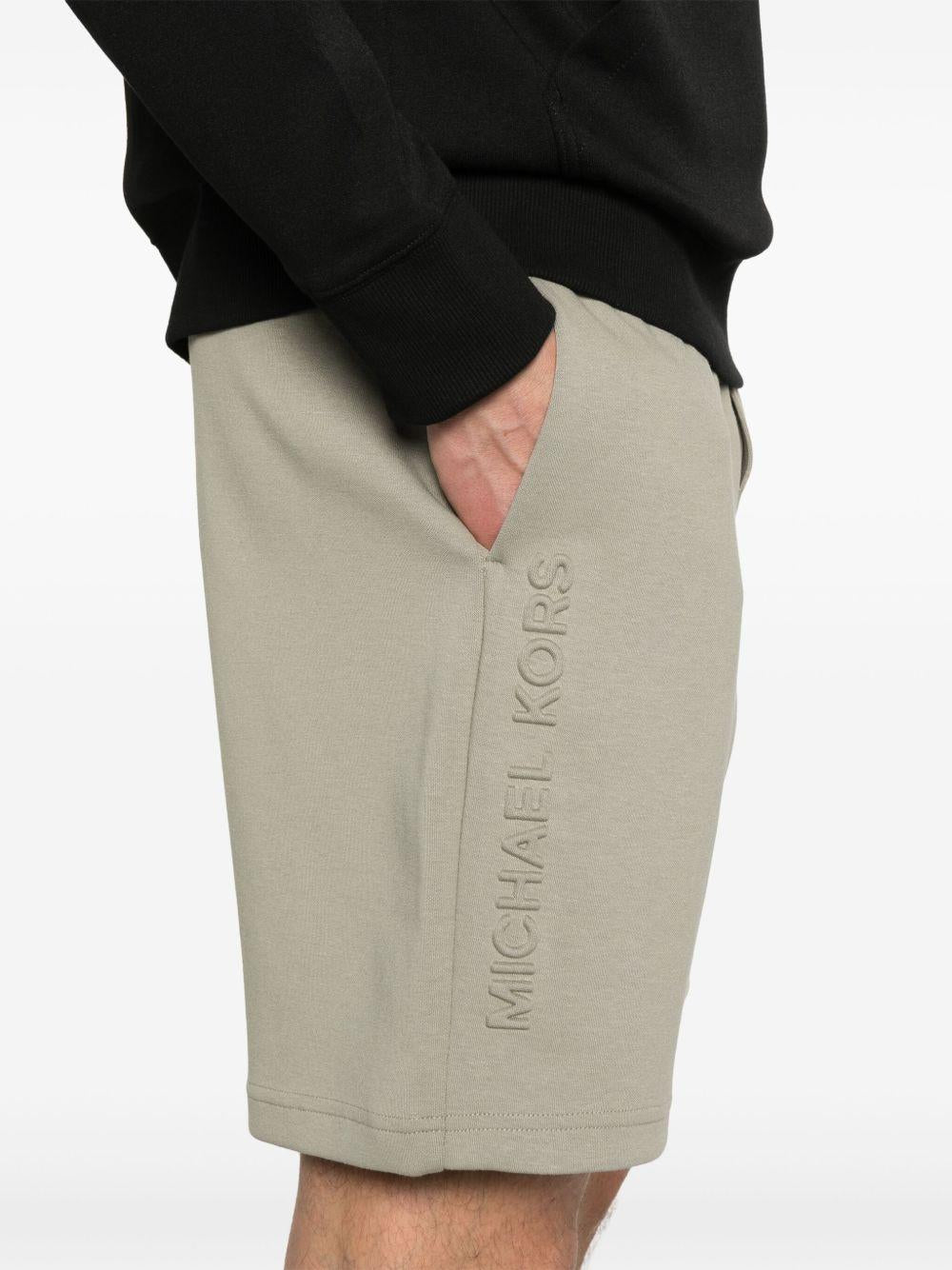Bermuda beige logo laterale