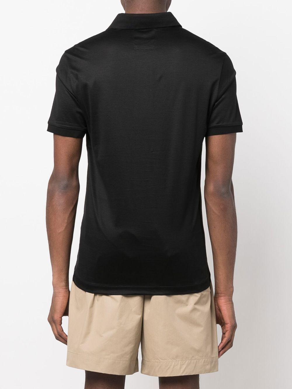 Black polo shirt with mini chest logo