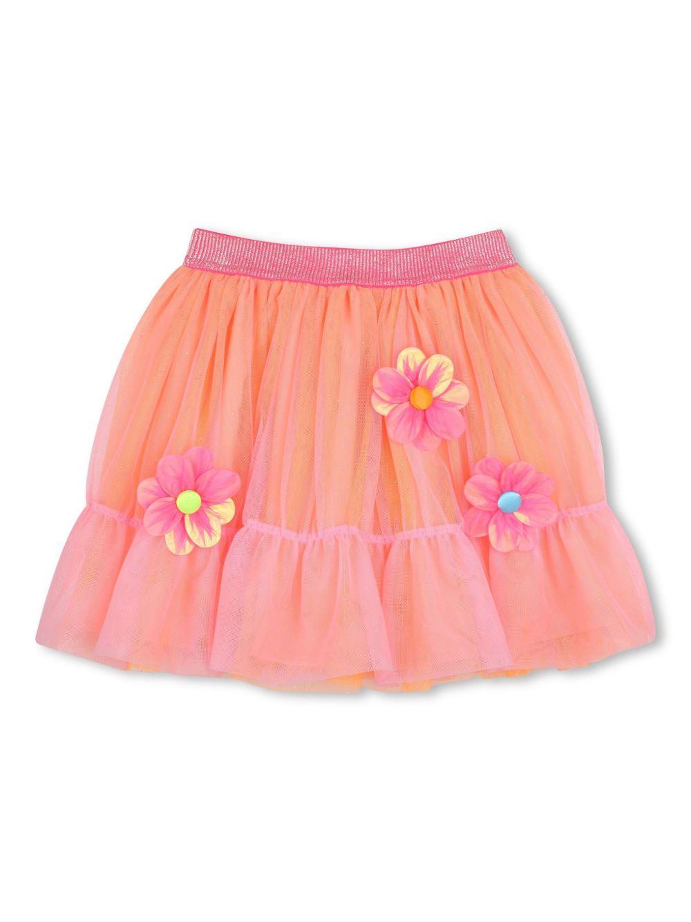 Gonna arancio in tulle con fiori applicati