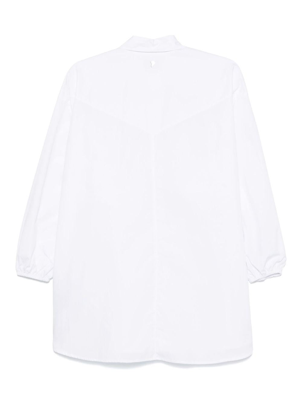 Camicia bianca ricami traforati