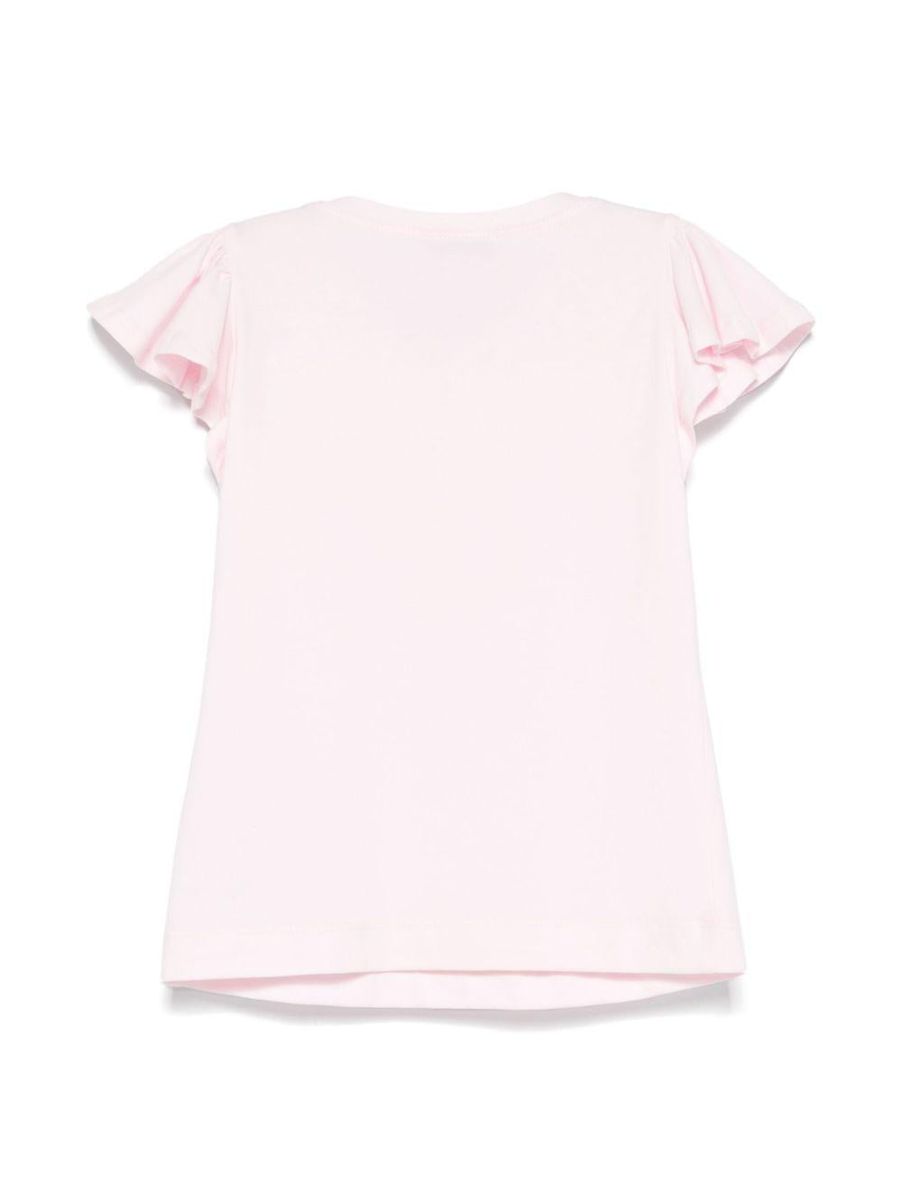 T-shirt rosa con applicazione floreale