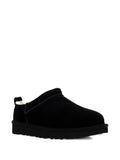 Scarpe neri in camoscio con shearling e punta tonda