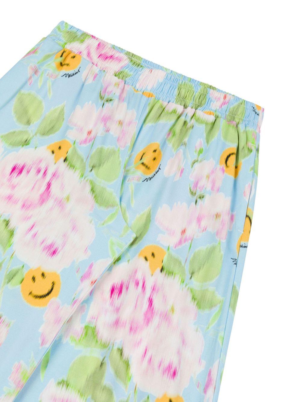 Pantalone fantasia floreale e smile