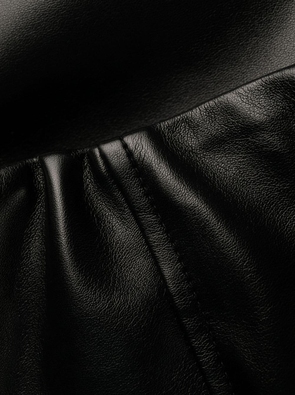 Pantalone nero zampa tessuto spalmato