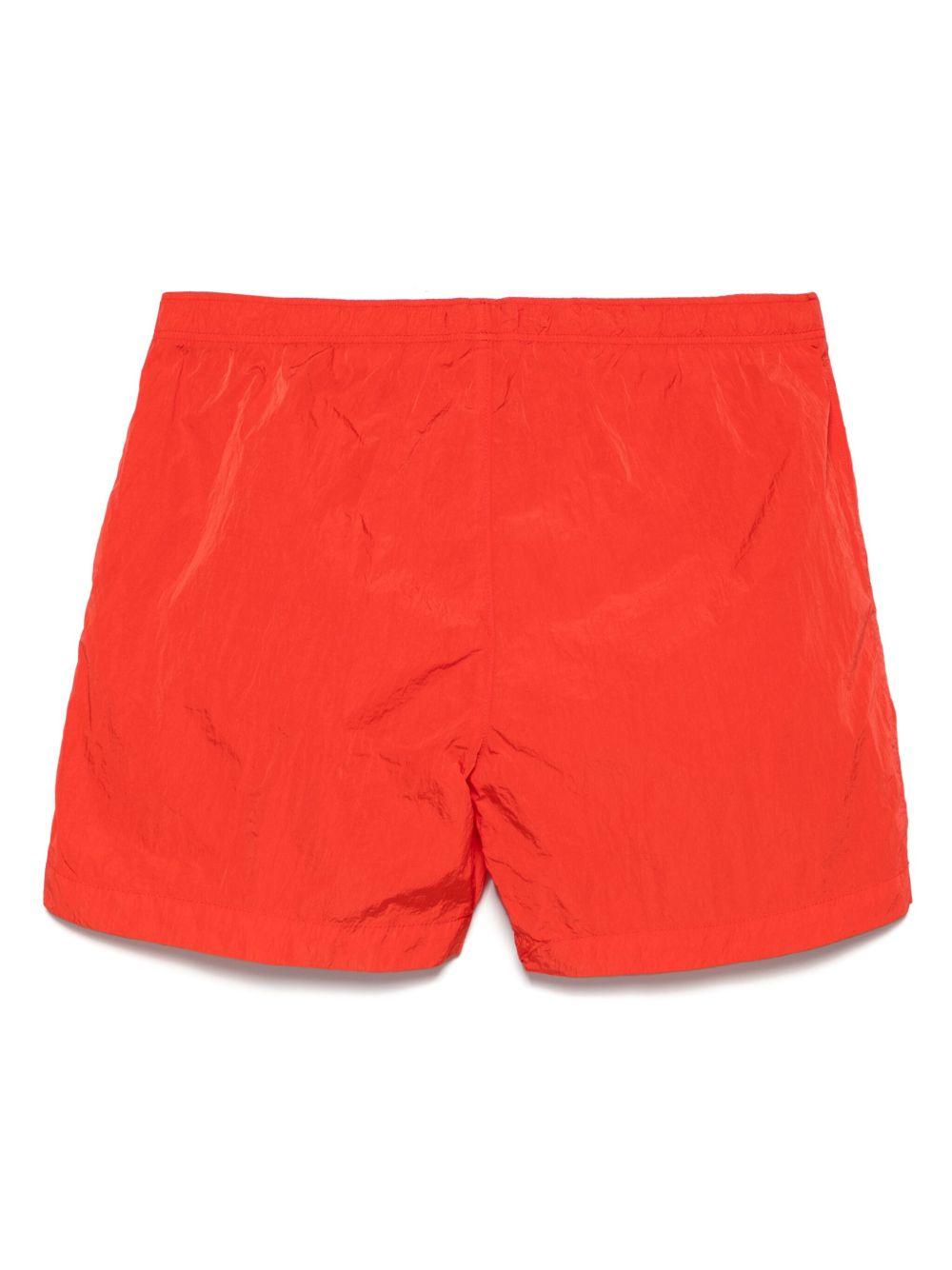 Costume boxer rosso arancio con mini etichetta