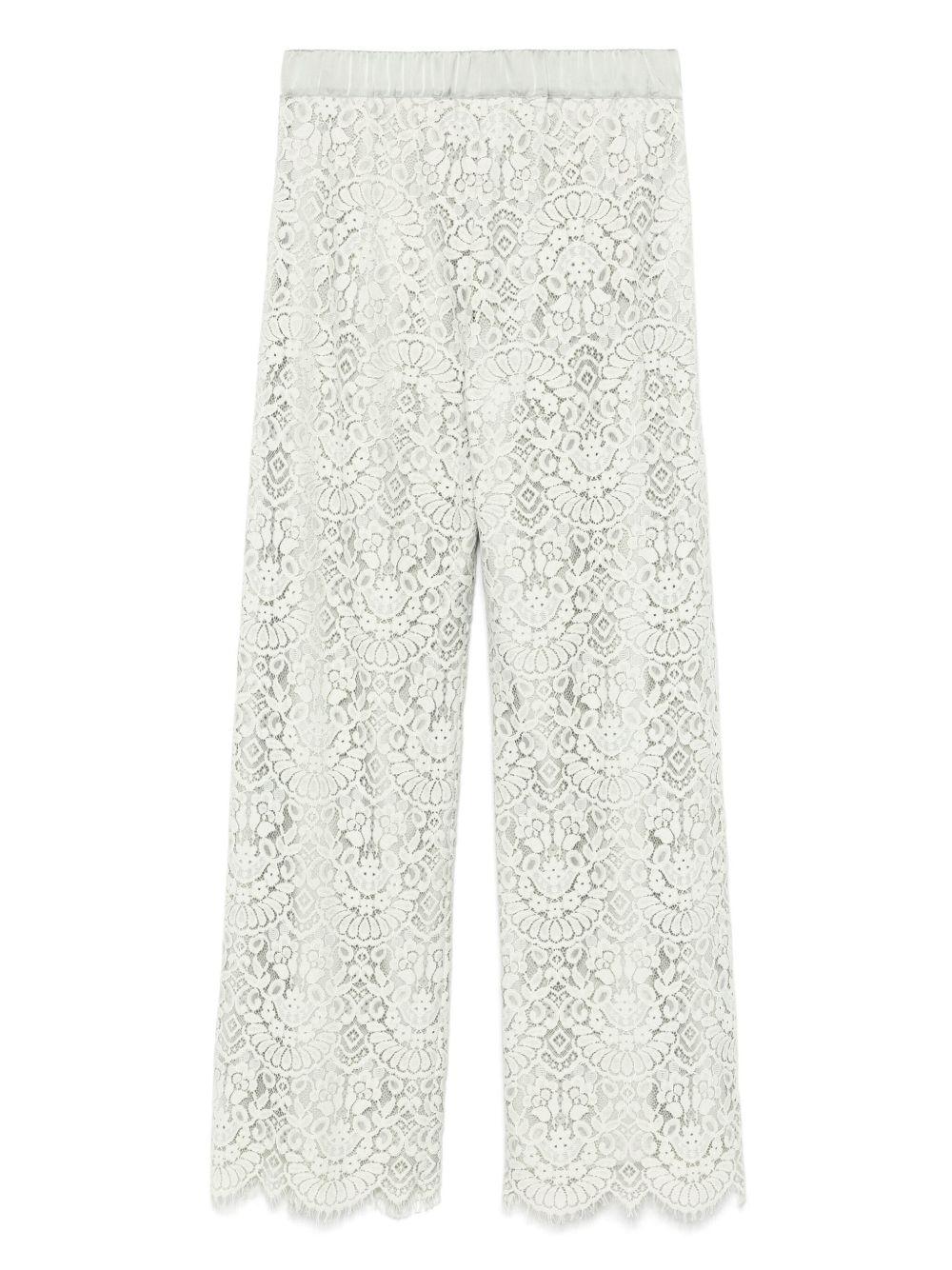 Pantalone verde giada ricami traforati