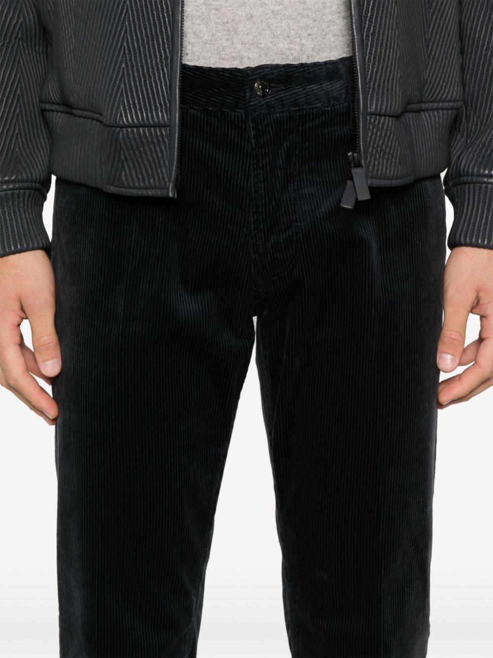 Pantalone blu a coste in velluto