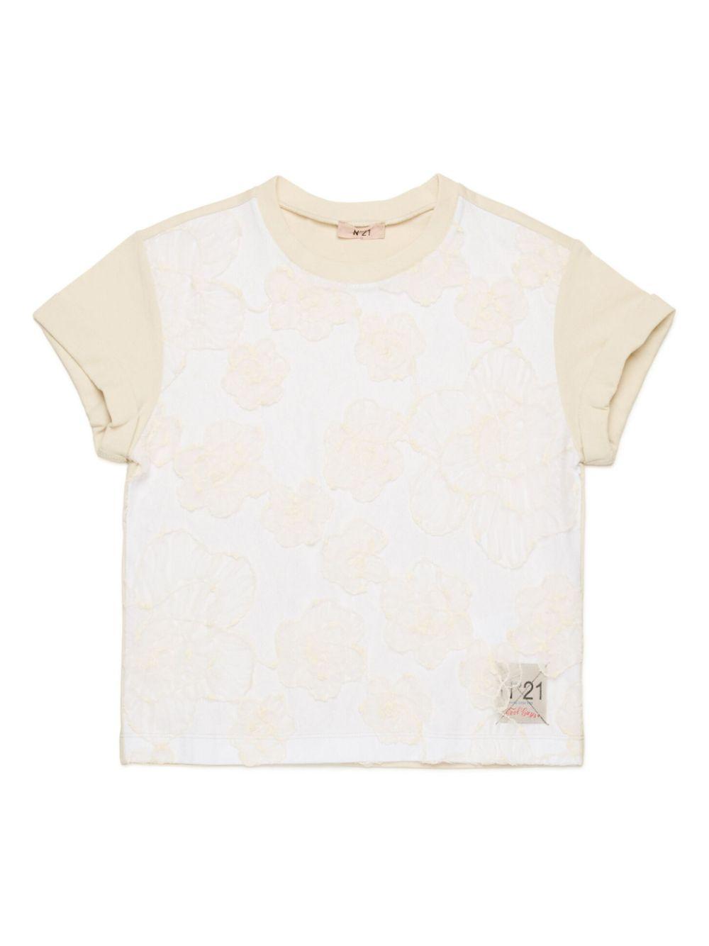 T-shirt beige con pizzo e fiori