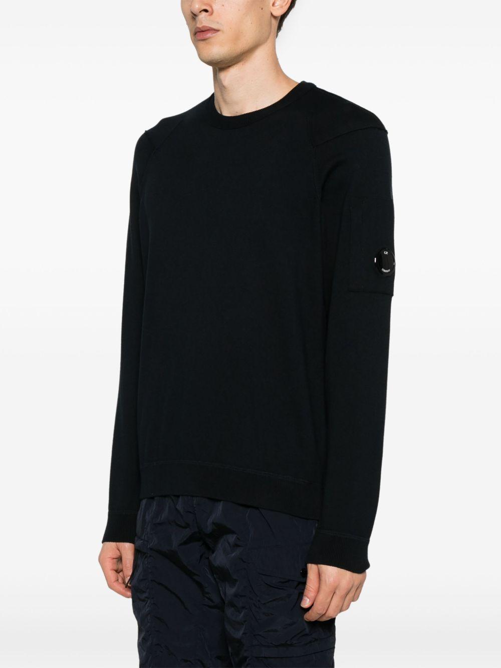 Maglione in filo blu logo lens sul braccio