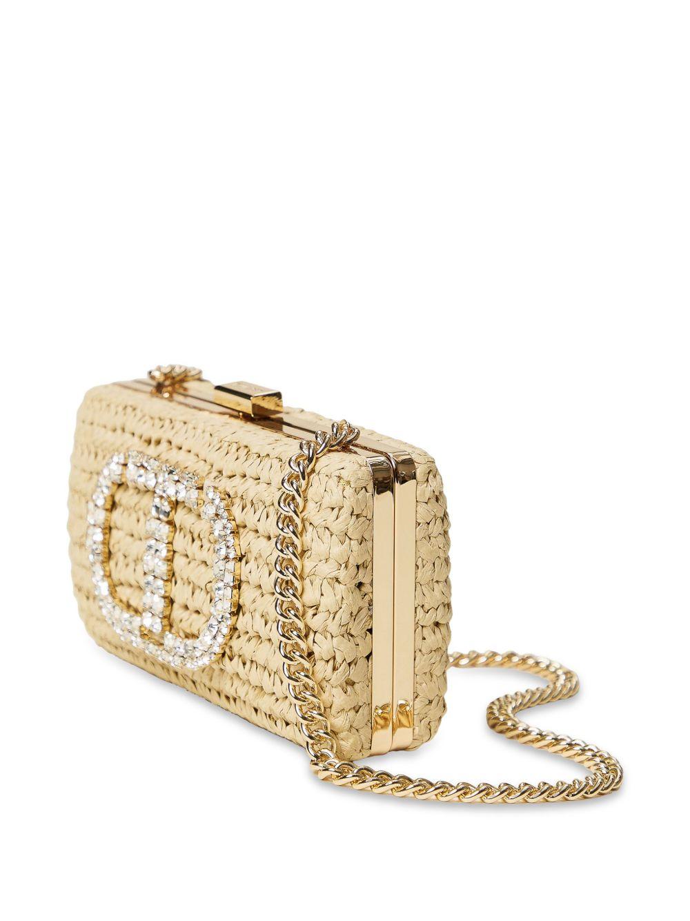 Clutch in paglia con Oval T con strass