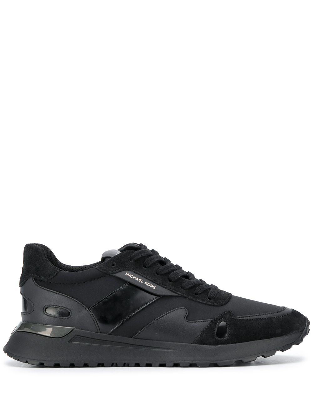 Sneakers nera inserti in pelle e tessuto
