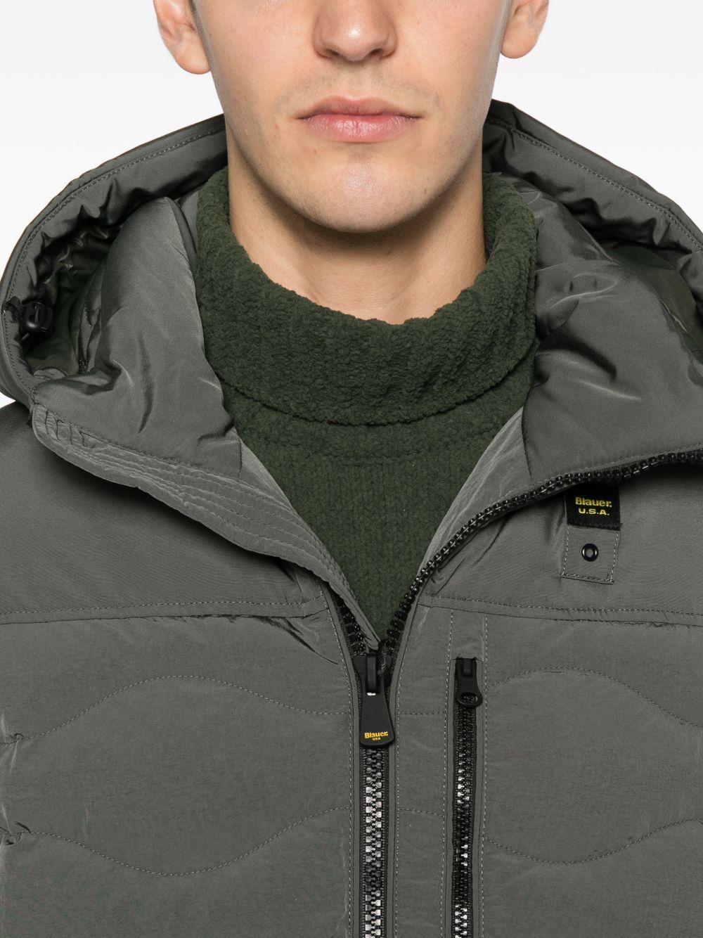 Giacca trapuntata verde con cappuccio 25WBLUC02534007287 678 BLAUER 