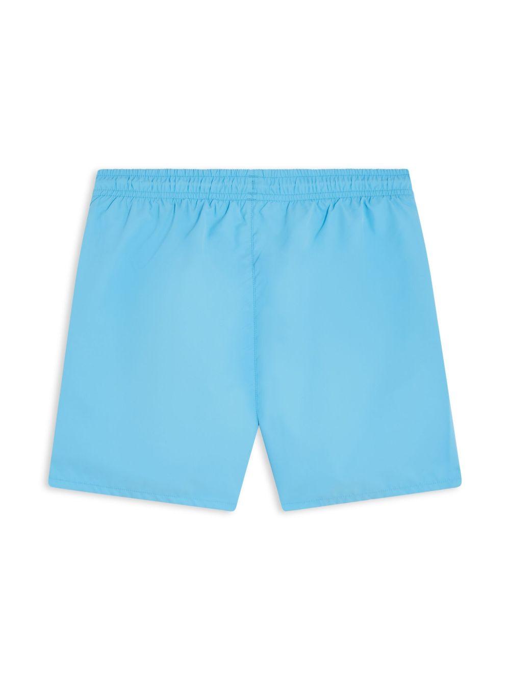 Costume azzurro tinta unita MJ4756 INI LACOSTE KIDS 