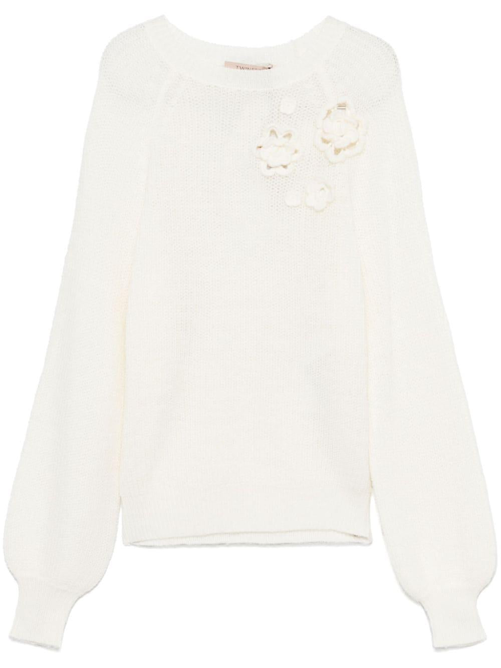 Maglione bianco con ricamo floreale