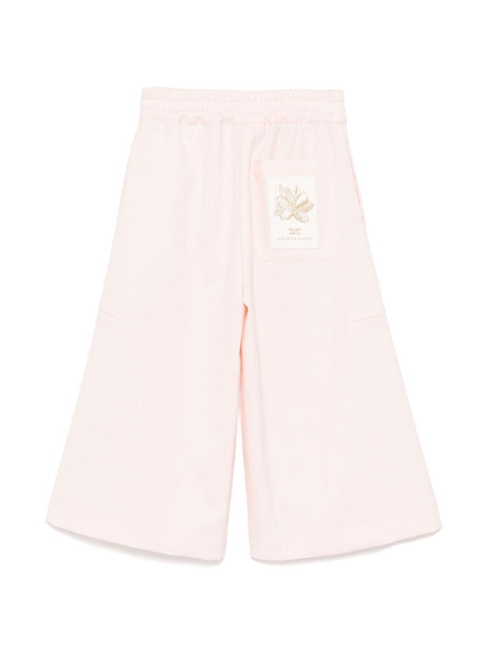 Pantalone a gamba ampia  rosa con ricamo