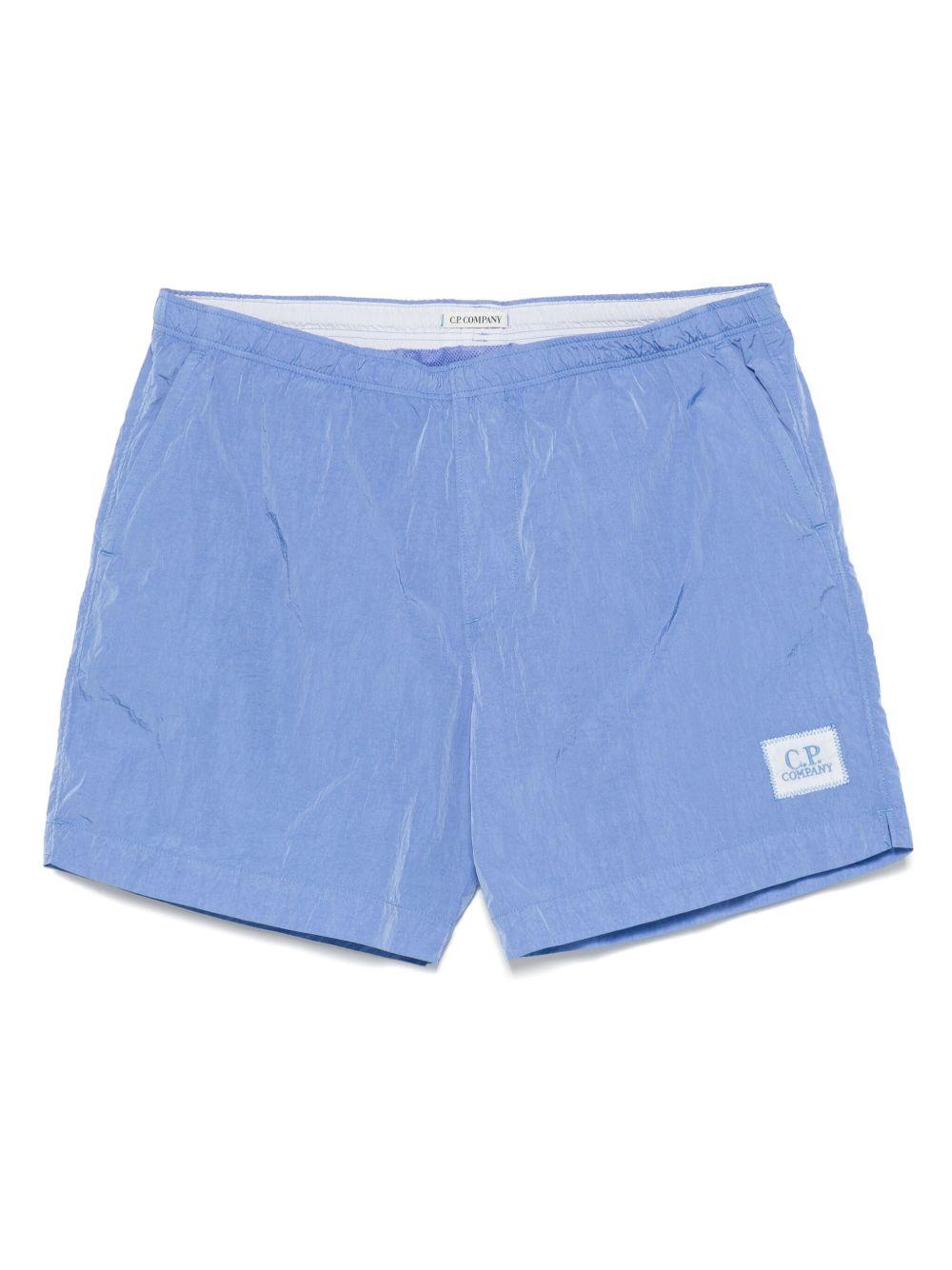 Costume boxer celeste con mini etichetta