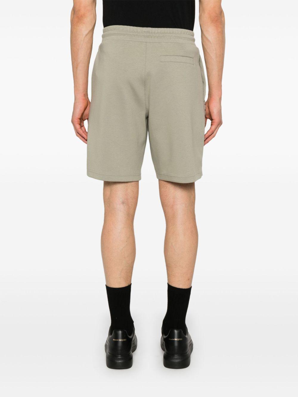 Bermuda beige logo laterale