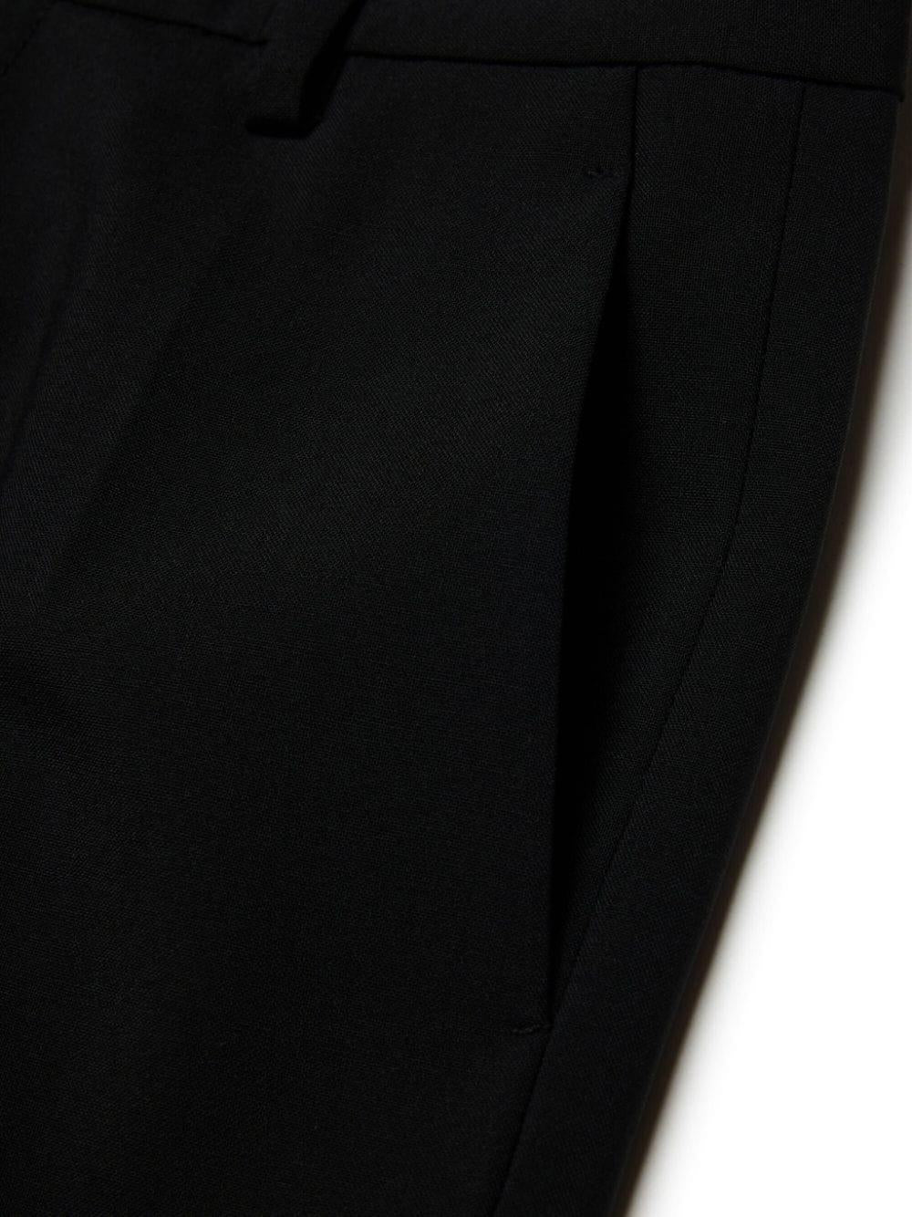 Pantalone nero con piega stirata lana