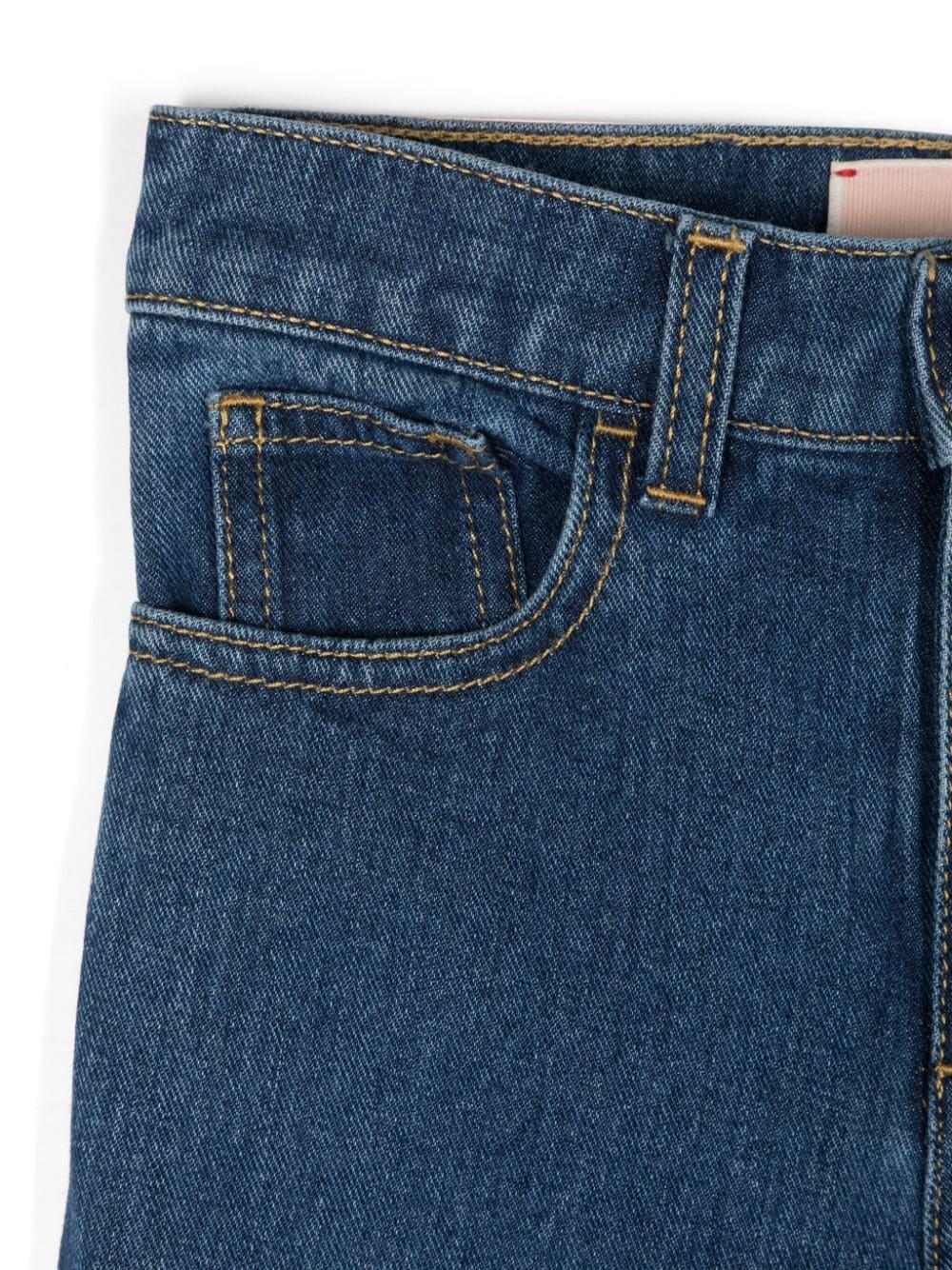 Jeans blu denim risvolto alto