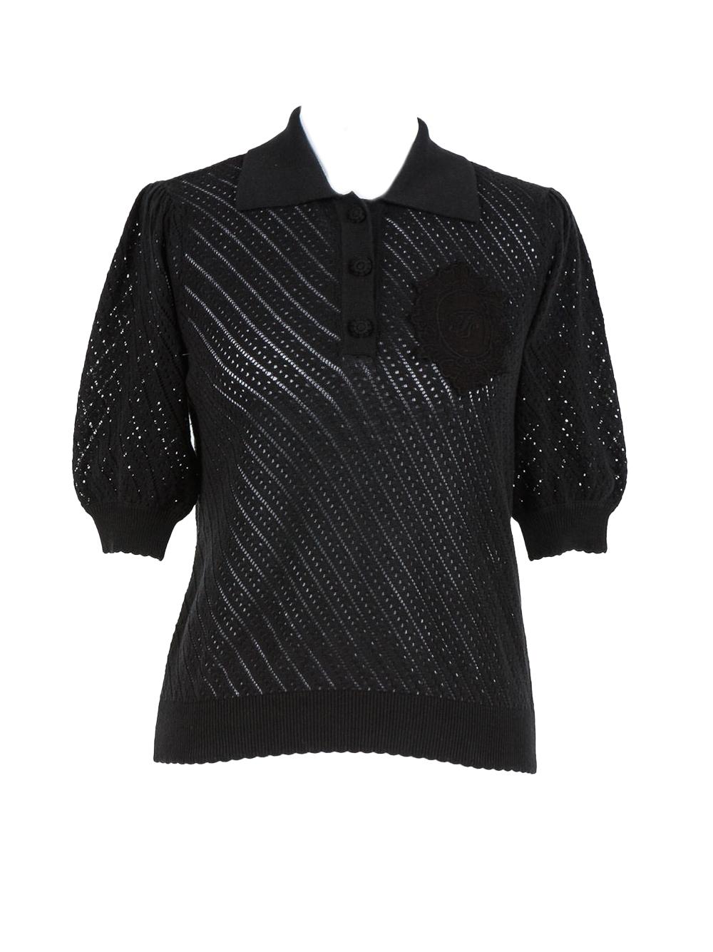 Maglia nera traforata con ricamo