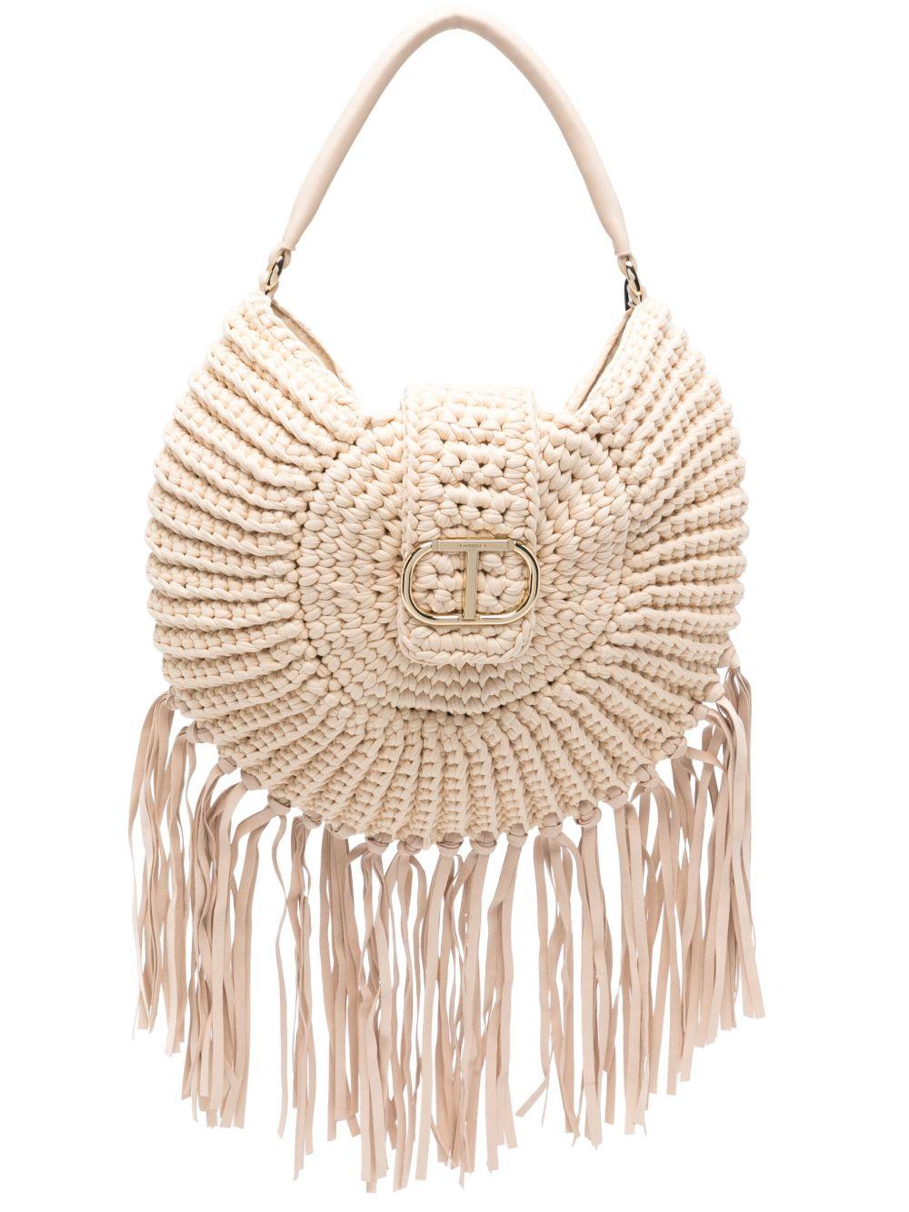 Borsa mezzaluna in rafia beige con frange