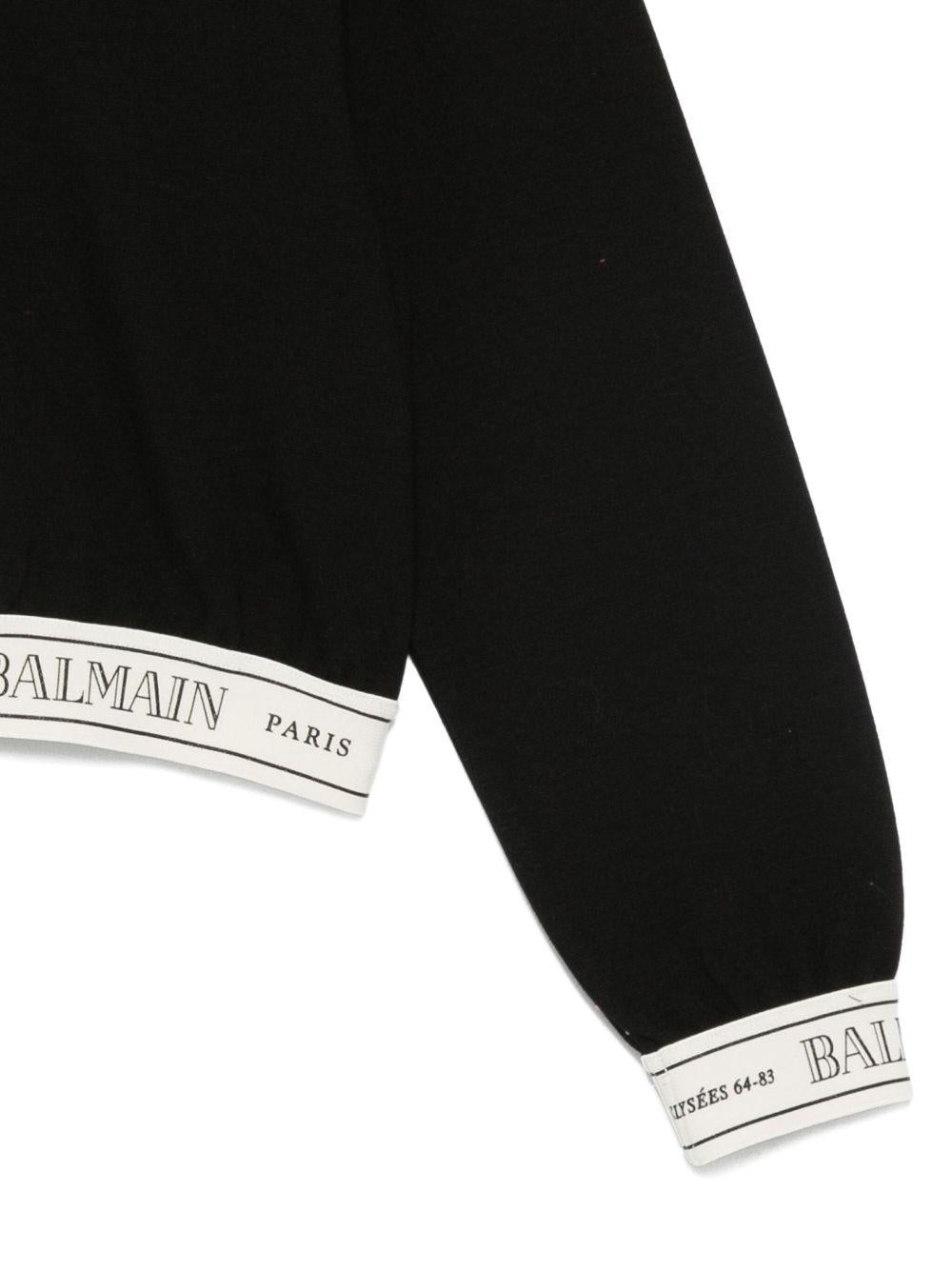 Top Nero Crop con Banda Logo BX4B90J0371 930AV BALMAIN KIDS 