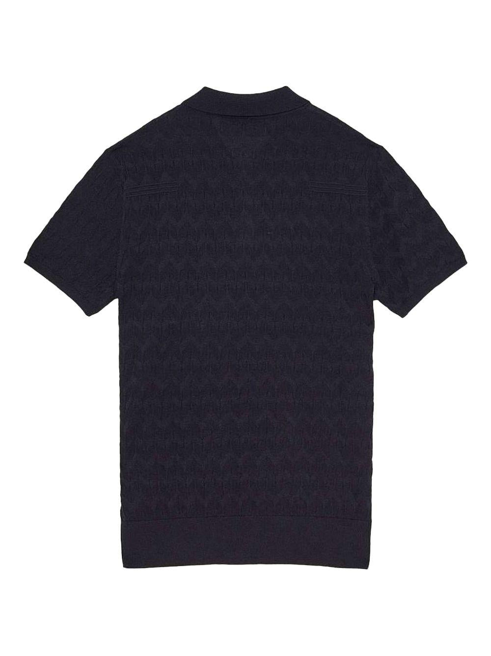 Polo in maglia blu motivo chevron