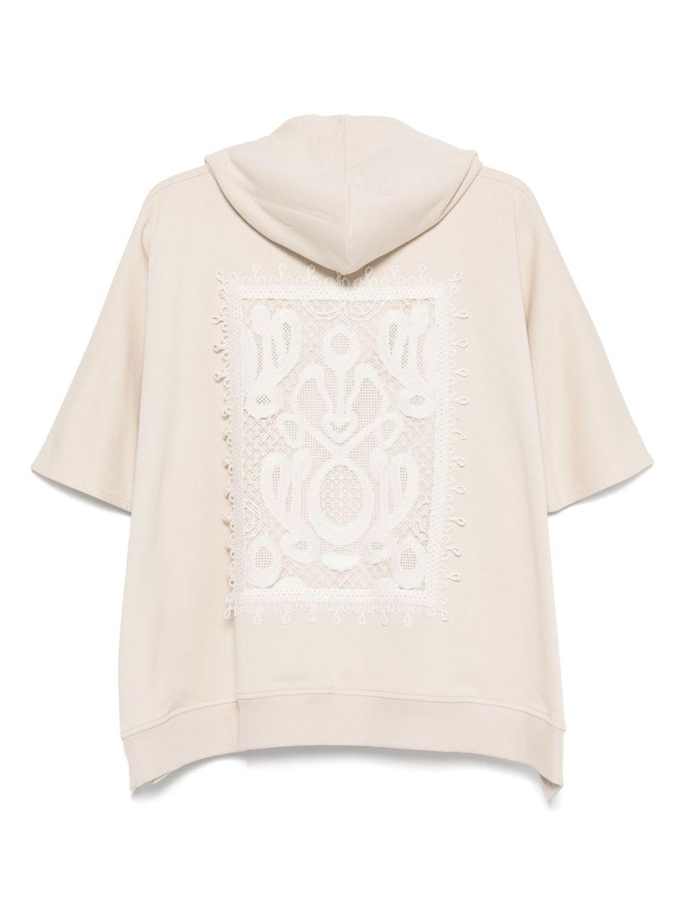 Poncho beige con ricamto retro