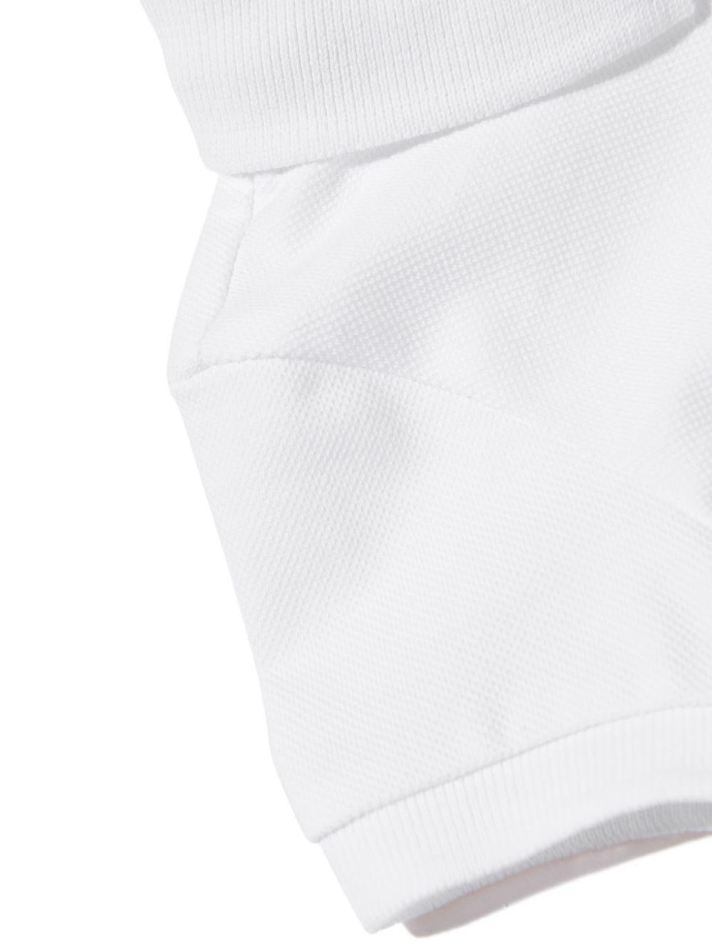 Polo in cotone con maniche corte MUM04JLFA09 10101 MOSCHINO KIDS 