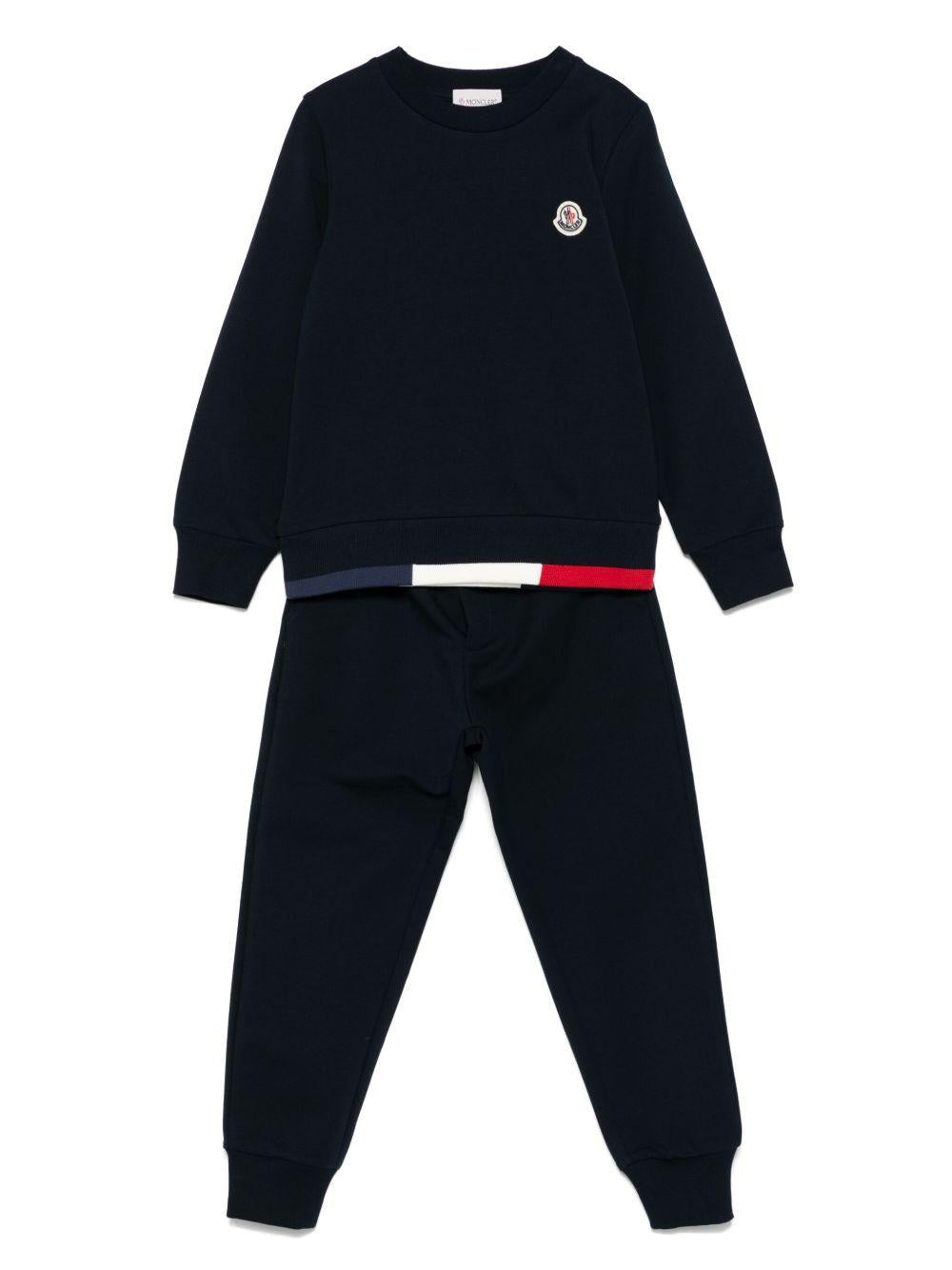 Tuta in cotone con patch logo L19548M0000589AEB 778 MONCLER KIDS 