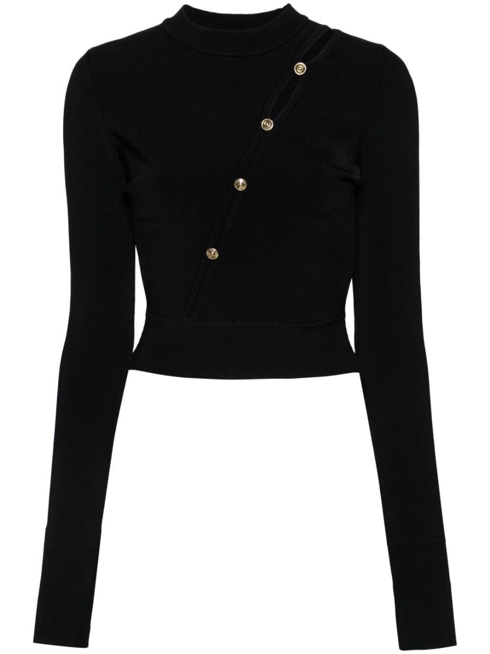 Maglia nera bottoni obliqui frontali