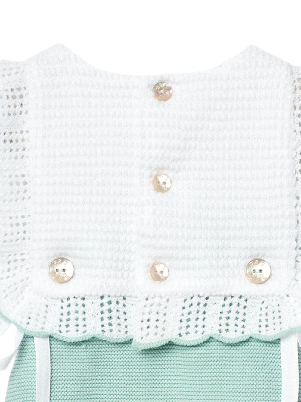 Tutina in maglia verde acqua con pettorina
