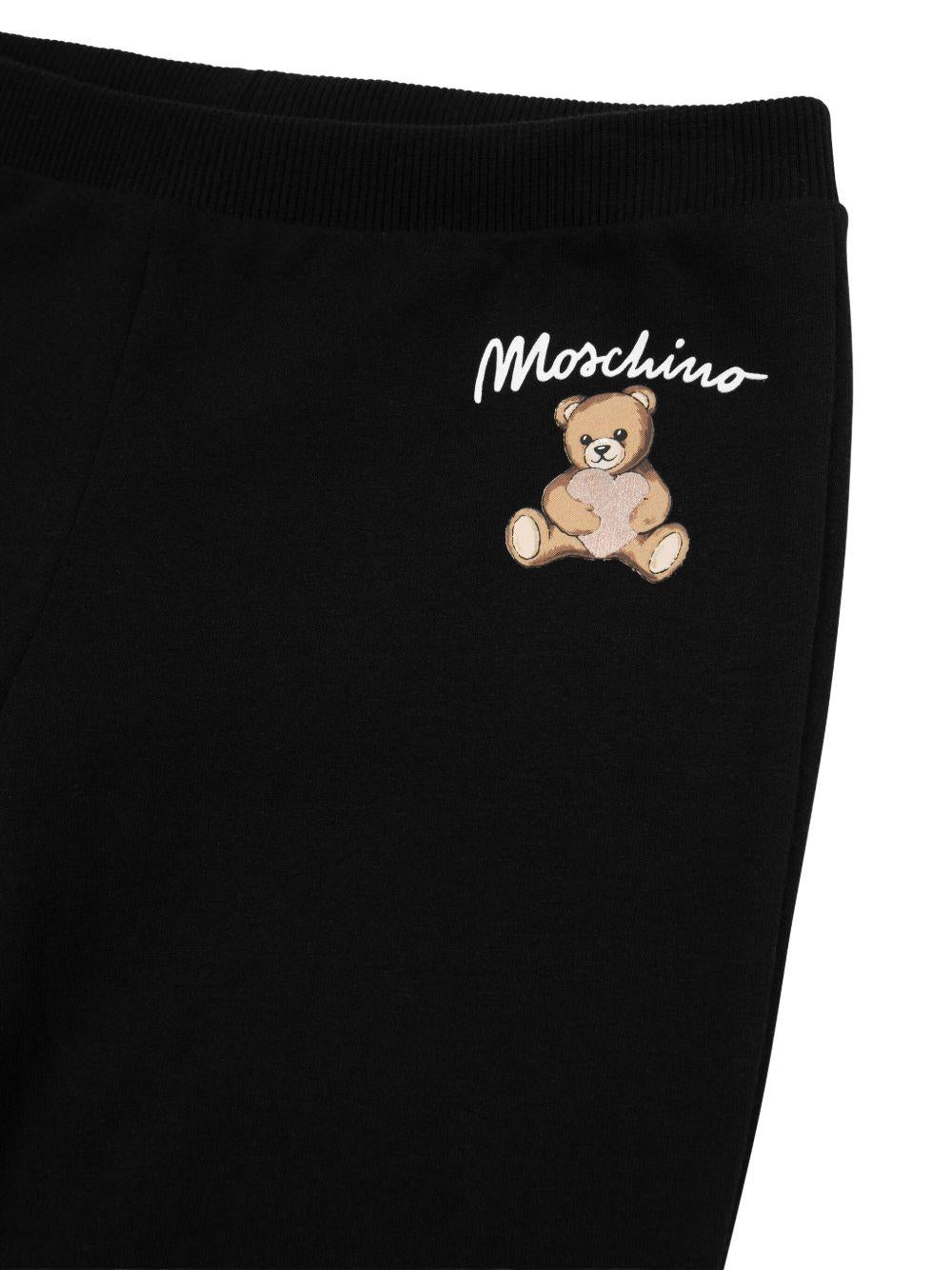 Leggings Neri con Stampa Logo e Orlo Svasato HCP050LDA14 60100 MOSCHINO KIDS 