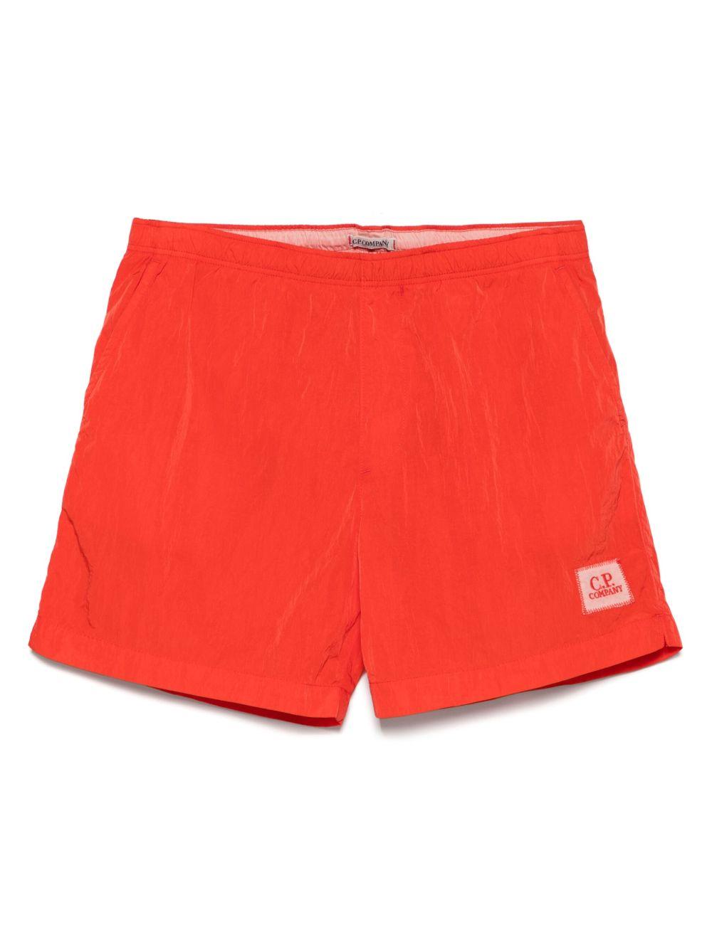 Costume boxer rosso arancio con mini etichetta