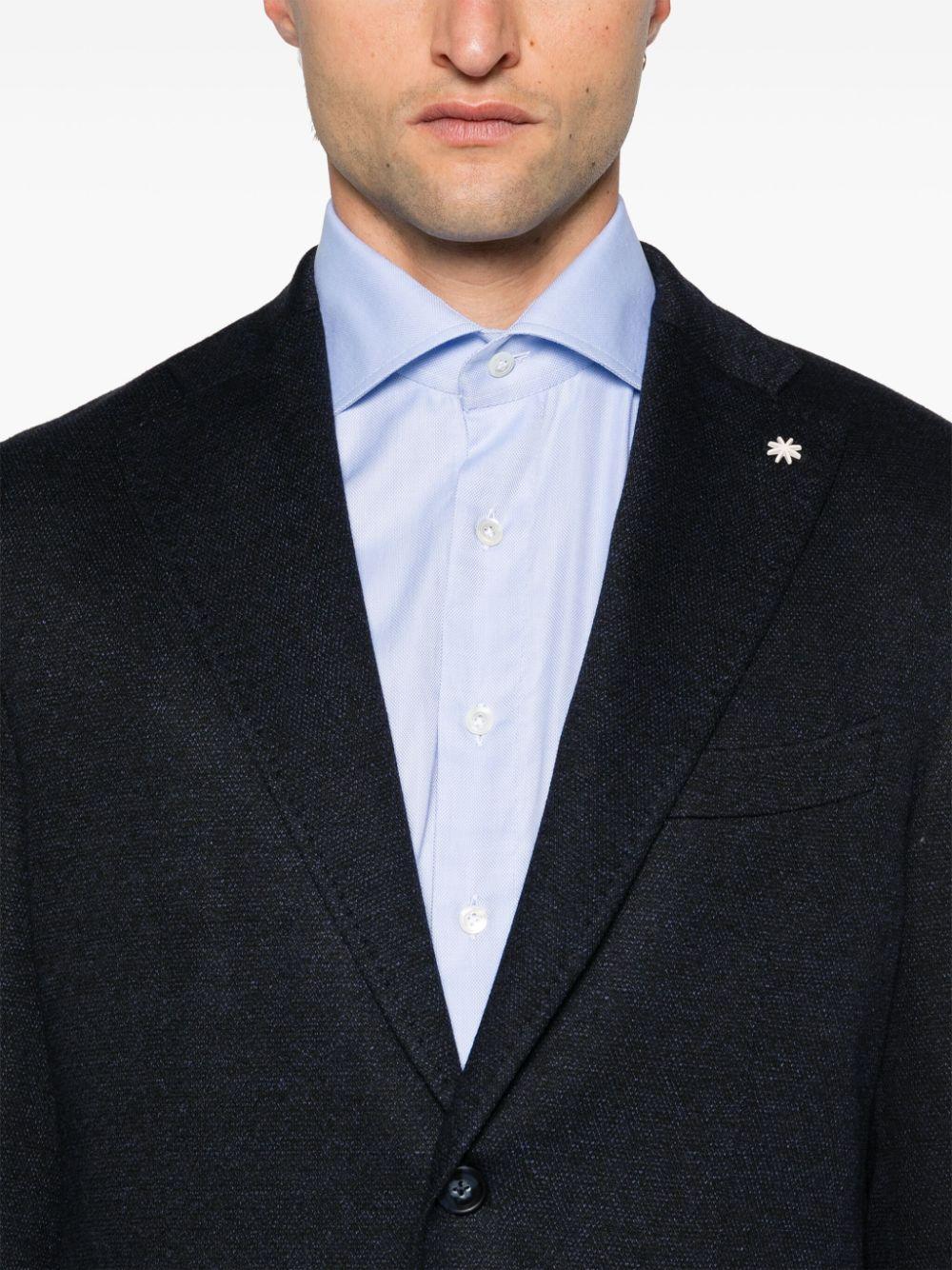 Blazer blu micro texture con spilla logo
