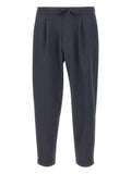 Pantaloni affusolati in poliestere con elastane